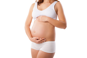 Image showing Beautiful belly of young attractive pregnant woman