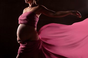 Image showing Beautiful pregnant woman in pink chiffon shawl