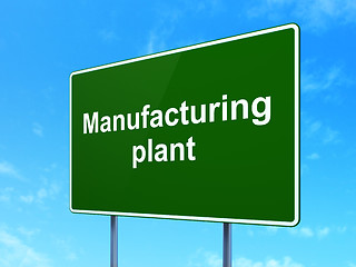 Image showing Industry concept: Manufacturing Plant on road sign background