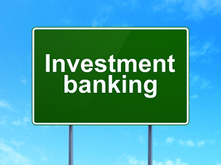 Image showing Currency concept: Investment Banking on road sign background