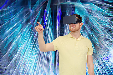 Image showing happy man in virtual reality headset or 3d glasses