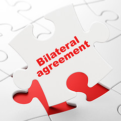 Image showing Insurance concept: Bilateral Agreement on puzzle background