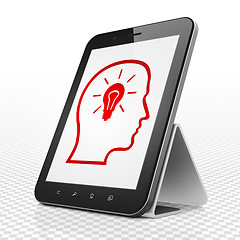 Image showing Finance concept: Tablet Computer with Head With Lightbulb on display