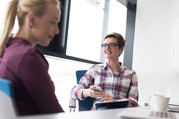 Image showing young business woman at modern office meeting room