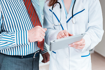 Image showing Close-up of doctor and patient hands