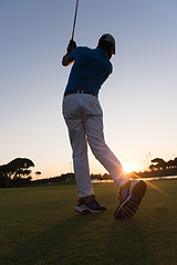 Image showing golfer hitting long shot