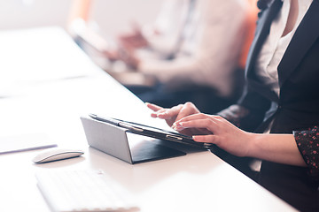 Image showing business woman on meeting  using tablet