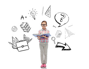 Image showing happy little girl in eyeglasses reading book