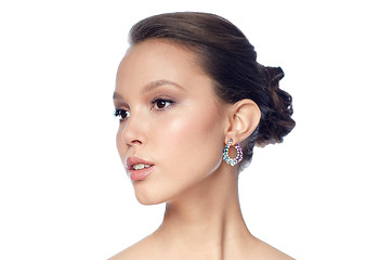 Image showing close up of beautiful woman face with earring