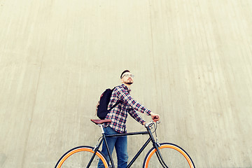 Image showing hipster man with fixed gear bike and backpack