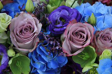 Image showing Blue and purple bridal bouquet