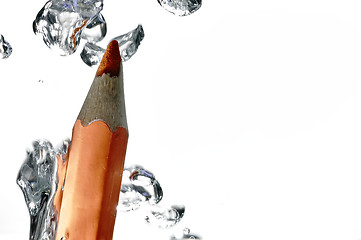 Image showing Crayon under water with bubbles of air.