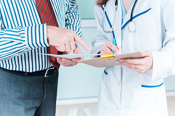 Image showing Close-up of doctor and patient hands