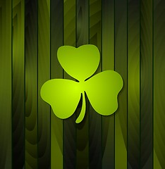 Image showing Clovers shamrock on green wooden background