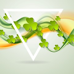 Image showing Green orange smooth waves and clovers shamrocks