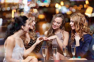 Image showing woman showing engagement ring to her friends