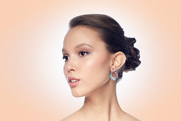 Image showing close up of beautiful woman face with earring