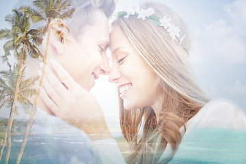 Image showing happy smiling young hippie couple over beach