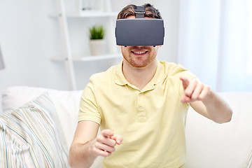 Image showing young man in virtual reality headset or 3d glasses