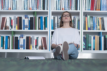 Image showing female student study in library