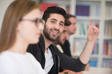 Image showing group of students  raise hands up