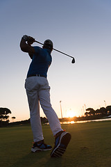 Image showing golfer hitting long shot