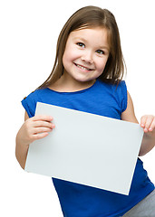 Image showing Little girl is holding blank banner