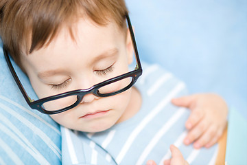 Image showing Cute little boy is sleeping