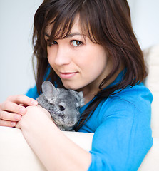 Image showing Woman with chinchilla