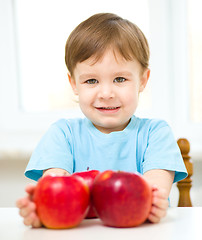 Image showing Portrait of a happy little boy with apples