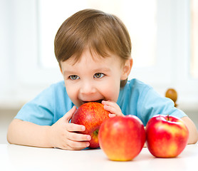 Image showing Portrait of a happy little boy with apples