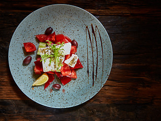 Image showing Fresh Greek salad in a bowl,