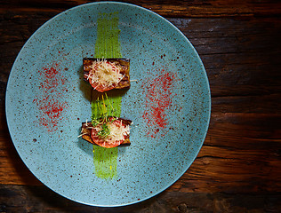 Image showing Baked aubergines with tomato