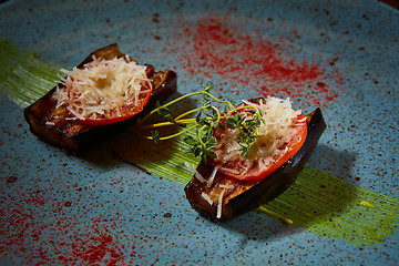 Image showing Baked aubergines with tomato