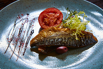 Image showing Fish dish - fried fish and vegetables