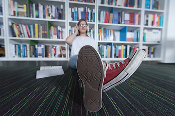 Image showing female student study in library