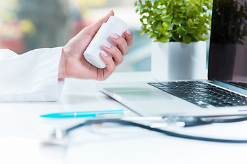 Image showing The doctor with pill in hospital