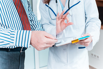 Image showing Close-up of doctor and patient hands