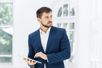 Image showing The elegant businessman in  the office