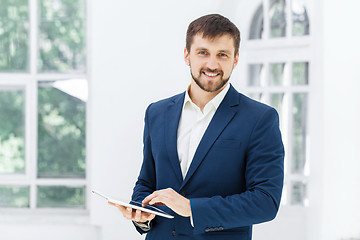 Image showing The elegant businessman in  the office