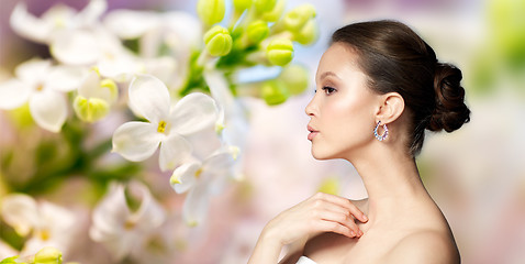 Image showing close up of beautiful woman face with earring