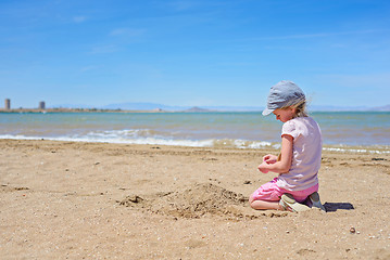 Image showing Little girl playing on the Mar Menor beach