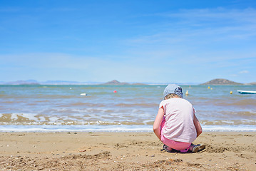 Image showing Little girl playing on the Mar Menor beach