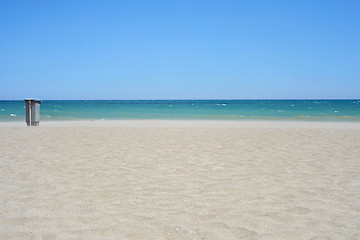 Image showing Garbage container on sandy beach Mediterranean sea