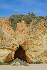 Image showing Rock, cave and sky in praia da Rocha, Algarve