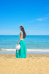 Image showing Brunette with long hair on the Mediterranean sea