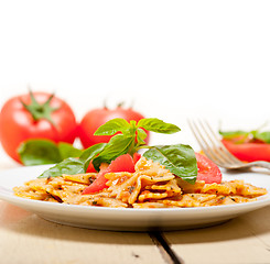 Image showing Italian pasta farfalle butterfly bow-tie and tomato sauce