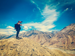 Image showing Photographer taking photos in Himalayas 