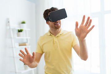 Image showing young man in virtual reality headset or 3d glasses