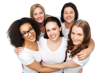 Image showing group of happy different women in white t-shirts